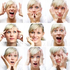 images of 9 female faces showing emotional expression