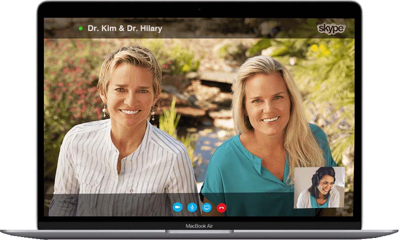 Doctors Kim and Hilary in a Skype Call flashed on a MacBook Air